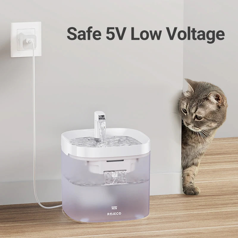 Cat drinking from ROJECo pet water fountain with safe 5V low voltage, ideal for cats and dogs